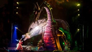 Mickey and the Maleficent dragon in Fantasmic