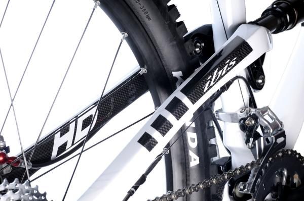 The understated paint jobs leave tasteful windows of clearcoated carbon fiber exposed.