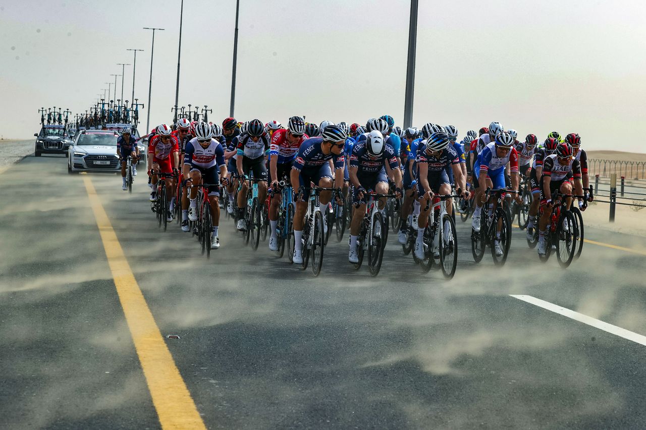 The desert winds at the UAE Tour blew sand across the road