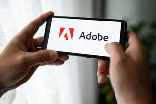 Adobe logo seen displayed on a smartphone