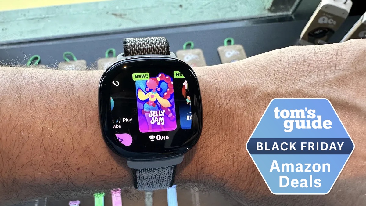 Fitbit Ace LTE on an arm with a black friday deal badge