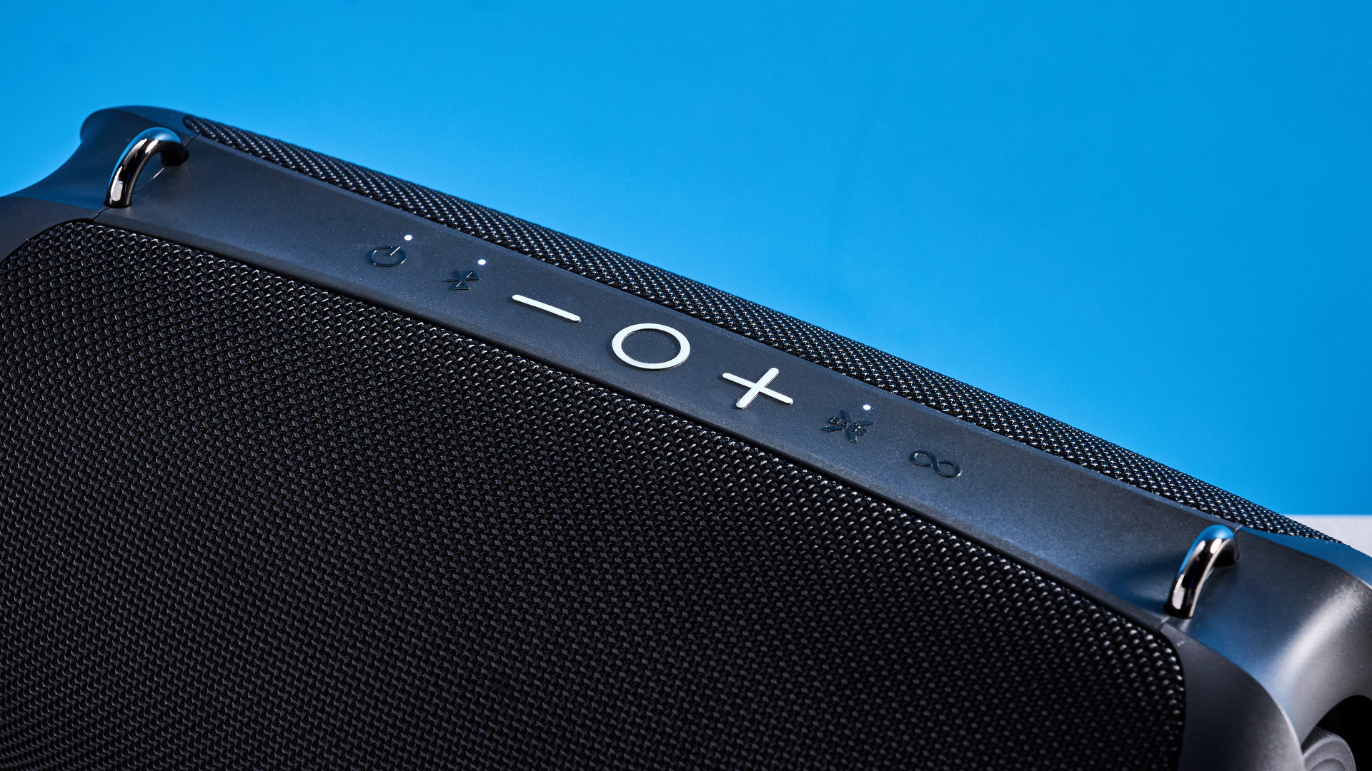 Tribit StormBox Lava Bluetooth Speaker photographed in front of a blue background.