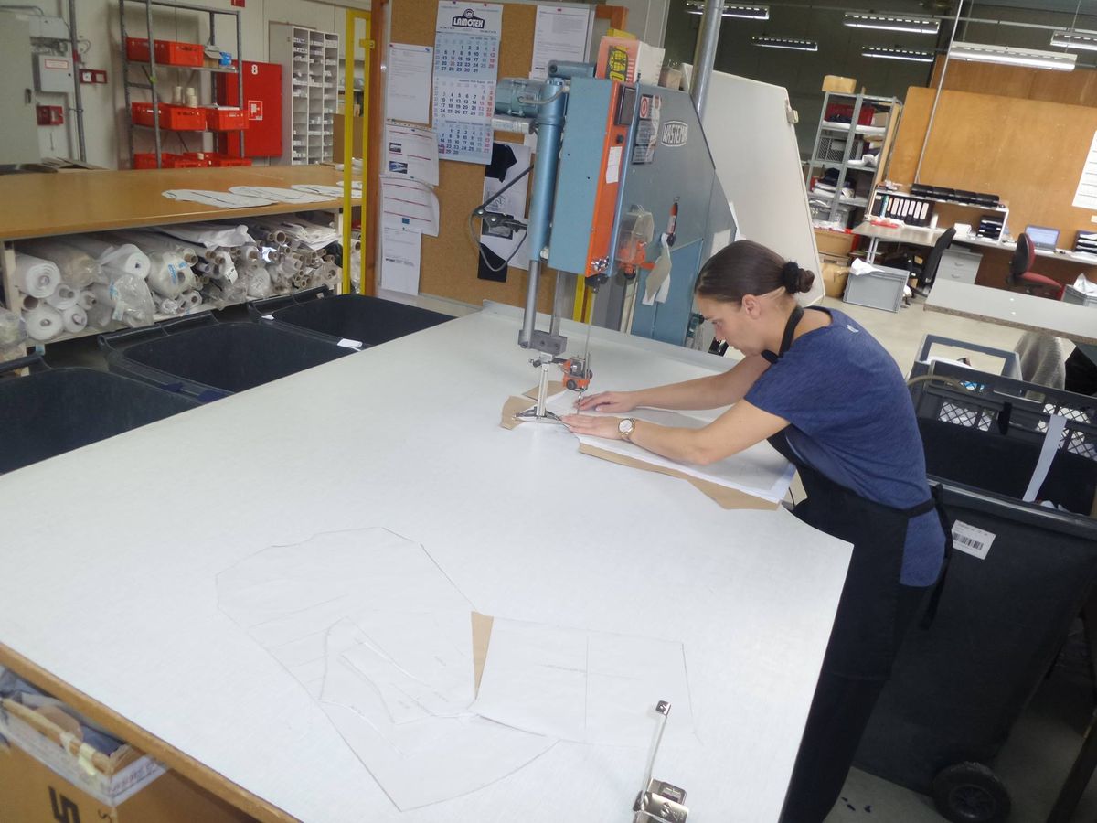 The fabric is cut for the jersey