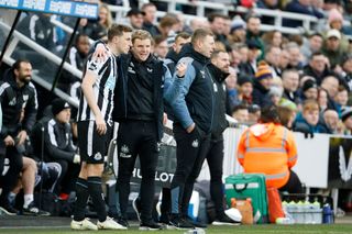 NEWCASTLE UPON TYNE, ENGLAND - JANUARY 15: Eddie Howe, Newcastle United manager with Chris Wood of Newcastle United during the Premier League match between Newcastle United and Fulham FC at St. James Park on January 15, 2023 in Newcastle upon Tyne, United Kingdom. (Photo by Richard Sellers/Getty Images)