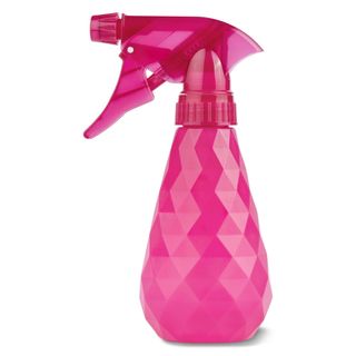 Side-on view of a pink plastic spray bottle