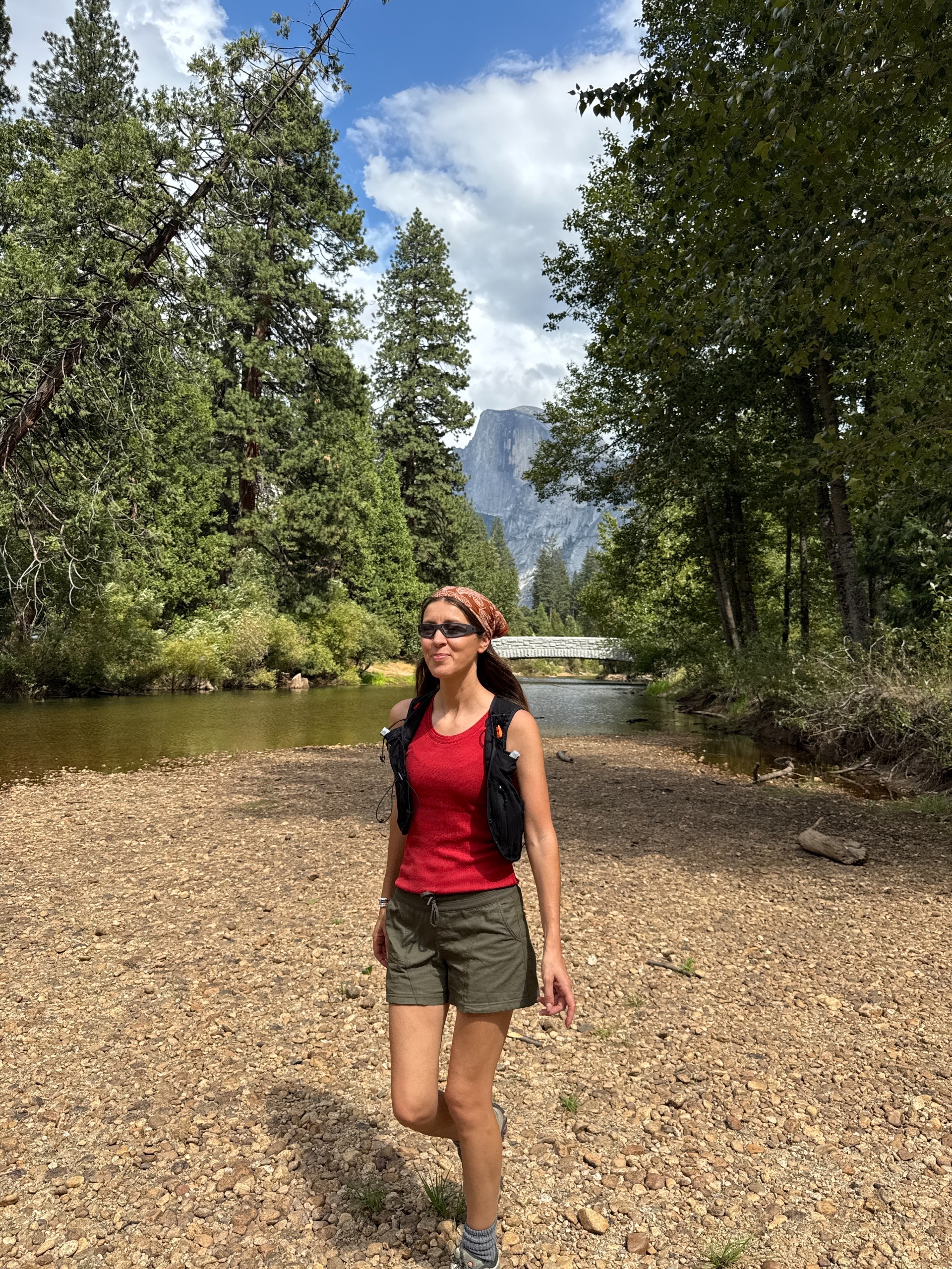 Judith Jones wearing a red hiking top and shorts in Yosemite