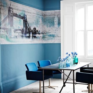 dining room with painted indigo blue walls