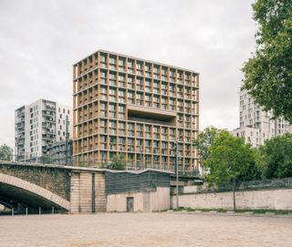 wood up wood architecture timber tower gridded facade, blocky construction in paris landscape