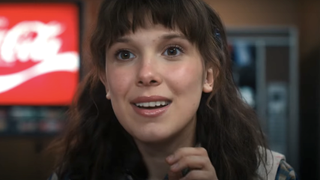 millie bobby brown as a smiling eleven in stranger things season 4