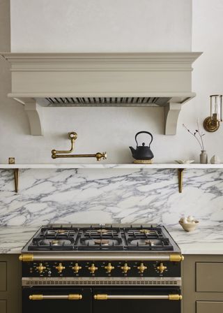 Shaker kitchen with marble and brass