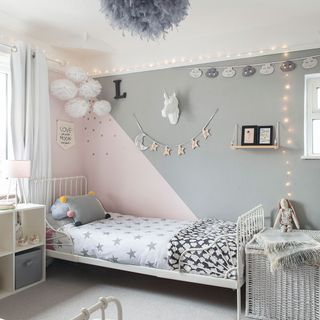 kids bed room with grey and pink wall and single bed
