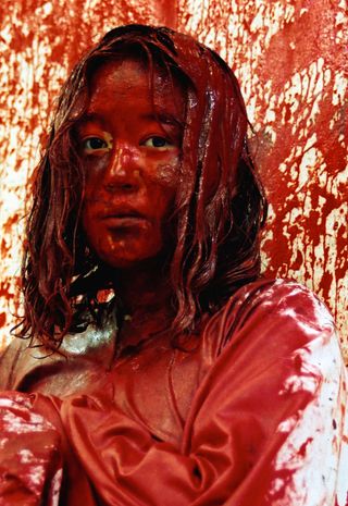 Chiharu Shiota work on Becoming Painting, 1994.