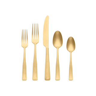 flatware set in gold with two forks, one knife, and two spoons