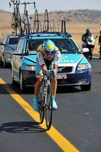 Alberto Contador (Astana) is chased by his team car...and a few other vehicles.