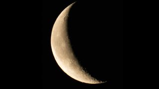 Astrophotographer B.G. Boyd captured this view of the crescent moon making its way toward Mars in the early morning sky over Tucson, Arizona, shortly before the occultation began on Feb. 18, 2020.