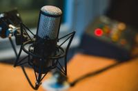 Image of microphone and podcast