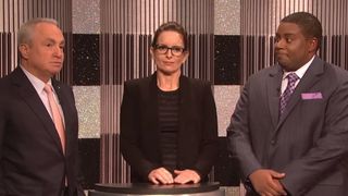 Tina Fey, Lorne Michaels and Kenan Thompson all talk during an SNL sketch about a fake game show.