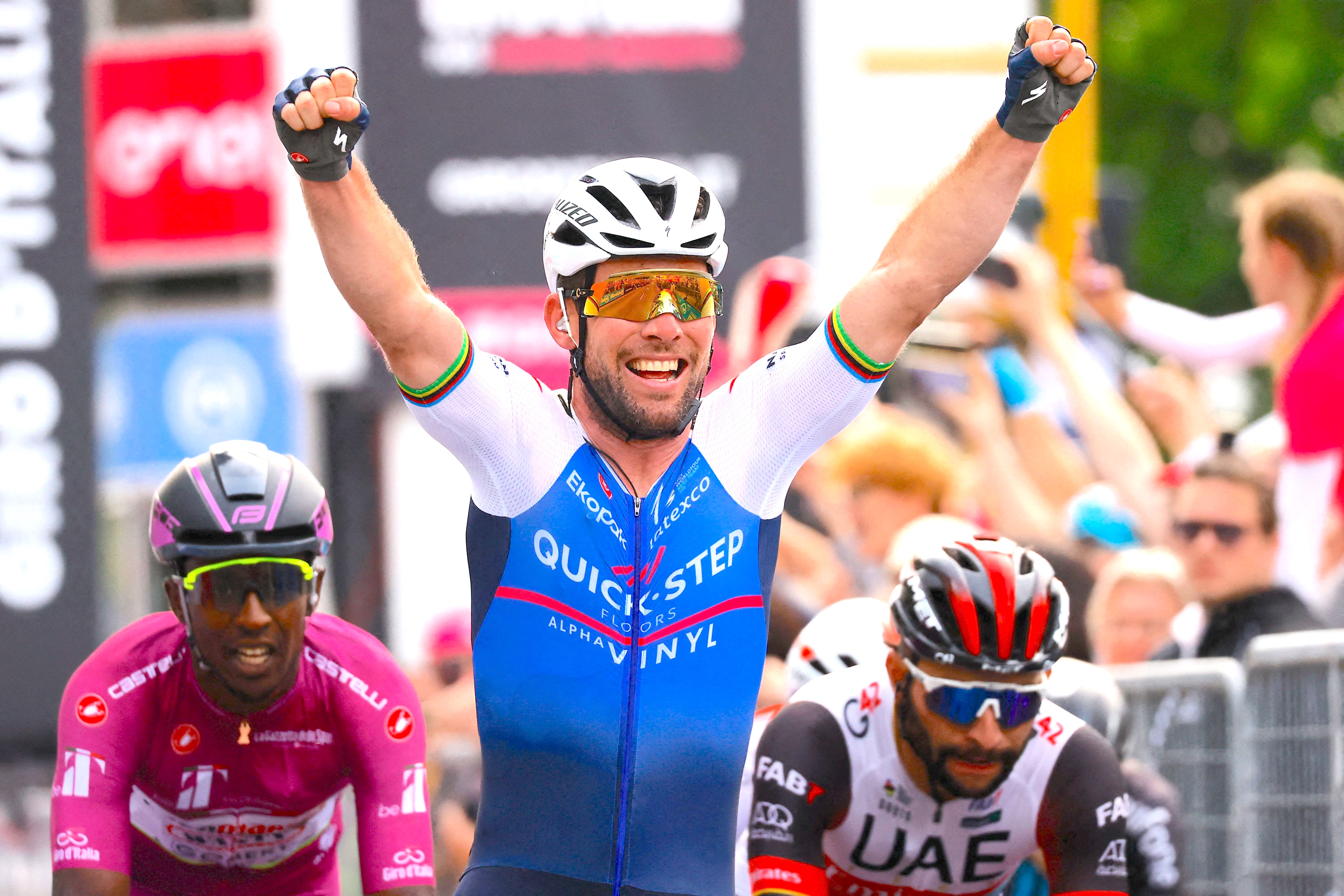 Team Quick-Step Alpha Vinyl's British rider Mark Cavendish celebrates after he crossed the finish line to win the third stage of the Giro d'Italia 2022 cycling race, 201 kilometers between Kaposvar and Balatonfured, Hungary, on May 8, 2022. (Photo by Luca Bettini / AFP) (Photo by LUCA BETTINI/AFP via Getty Images)