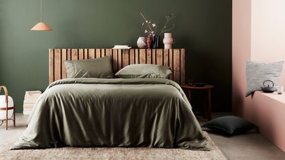 What is Tencel? - Tencel bedding in green silky in styled bedroom