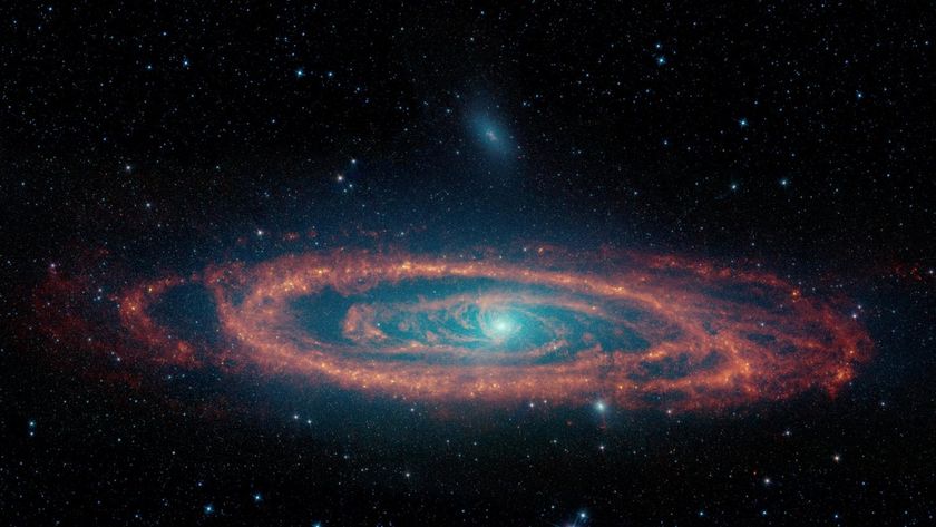 An image of a spiral galaxy with blue and orange colors