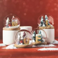 Monogram Snowglobe Woody Fresh Balsam &amp; Cedarwood Ceramic Candle |&nbsp;was £36.00&nbsp;now £27.00 at Anthropologie