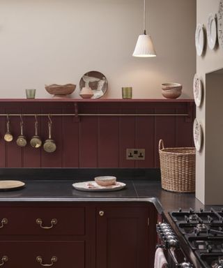 Modern rustic kitchen painted in a rusted red