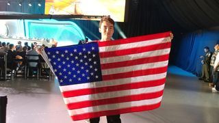 Team USA fan JT showed his support with a full-size American flag. Image: Damian Alonzo