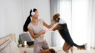 Woman dancing with dog