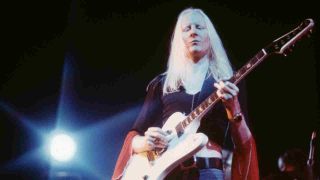 Johnny Winter performing onstage in the 1970s