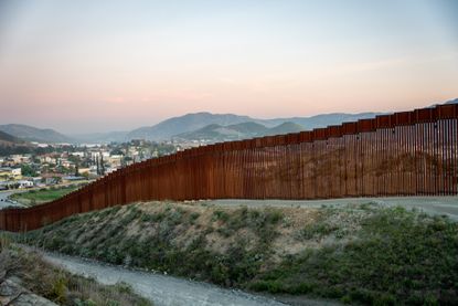 International Border Wall Between Tecate California and Tecate Mexico.