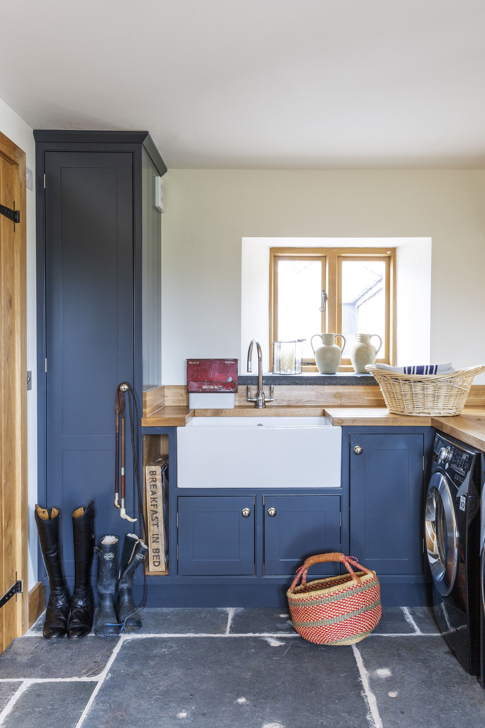 utility and boot room in restored Welsh barn