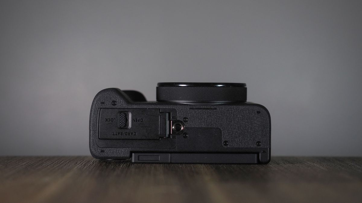 Canon PowerShot V1 on a wooden surface