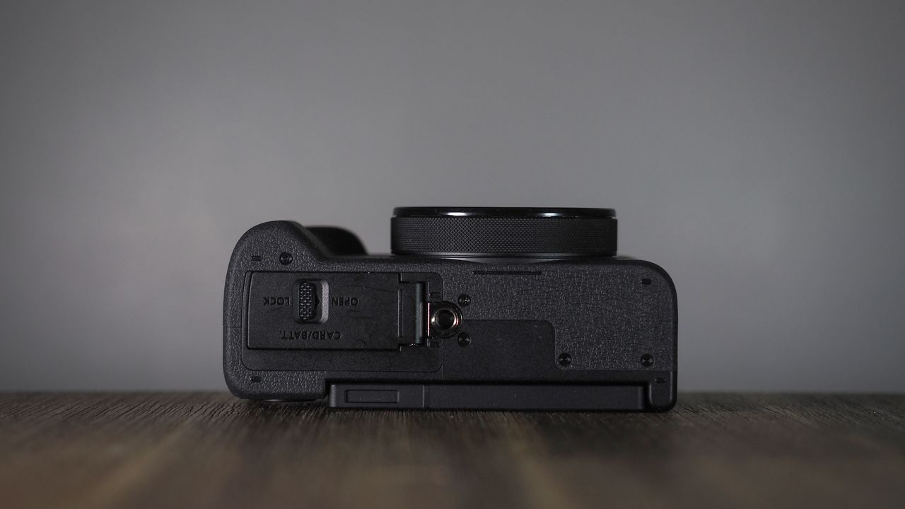 Canon PowerShot V1 on a wooden surface