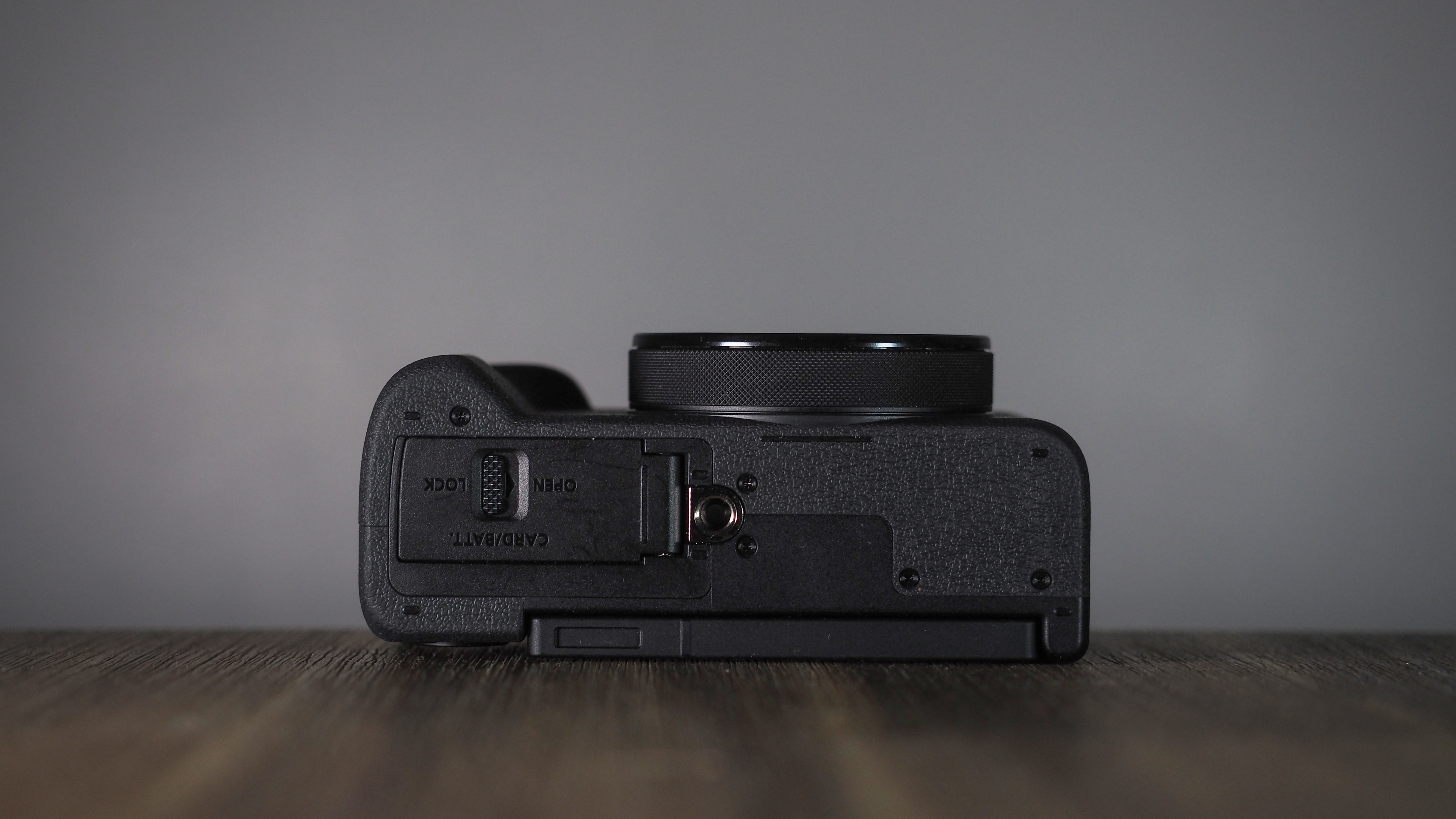 Canon PowerShot V1 on a wooden surface