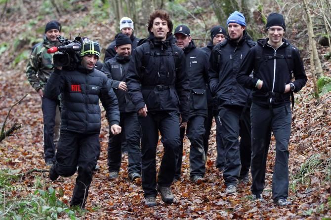 Fabian Cancellara leads his teammates through the woods.