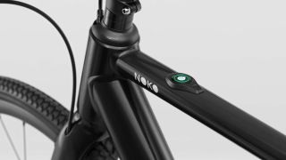 Close-up of the power button on the Noko Foza e-bike