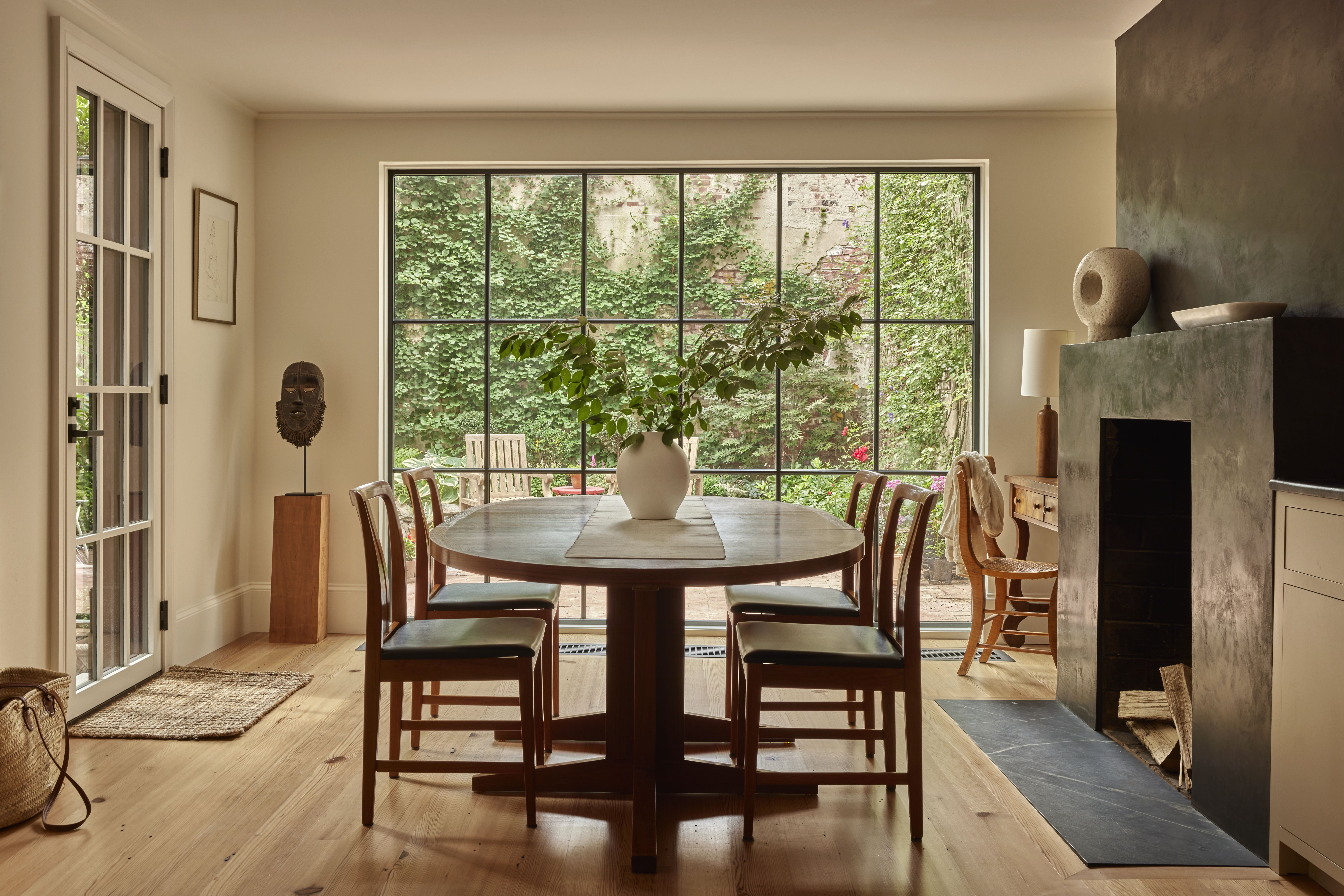 A dining room with large windows