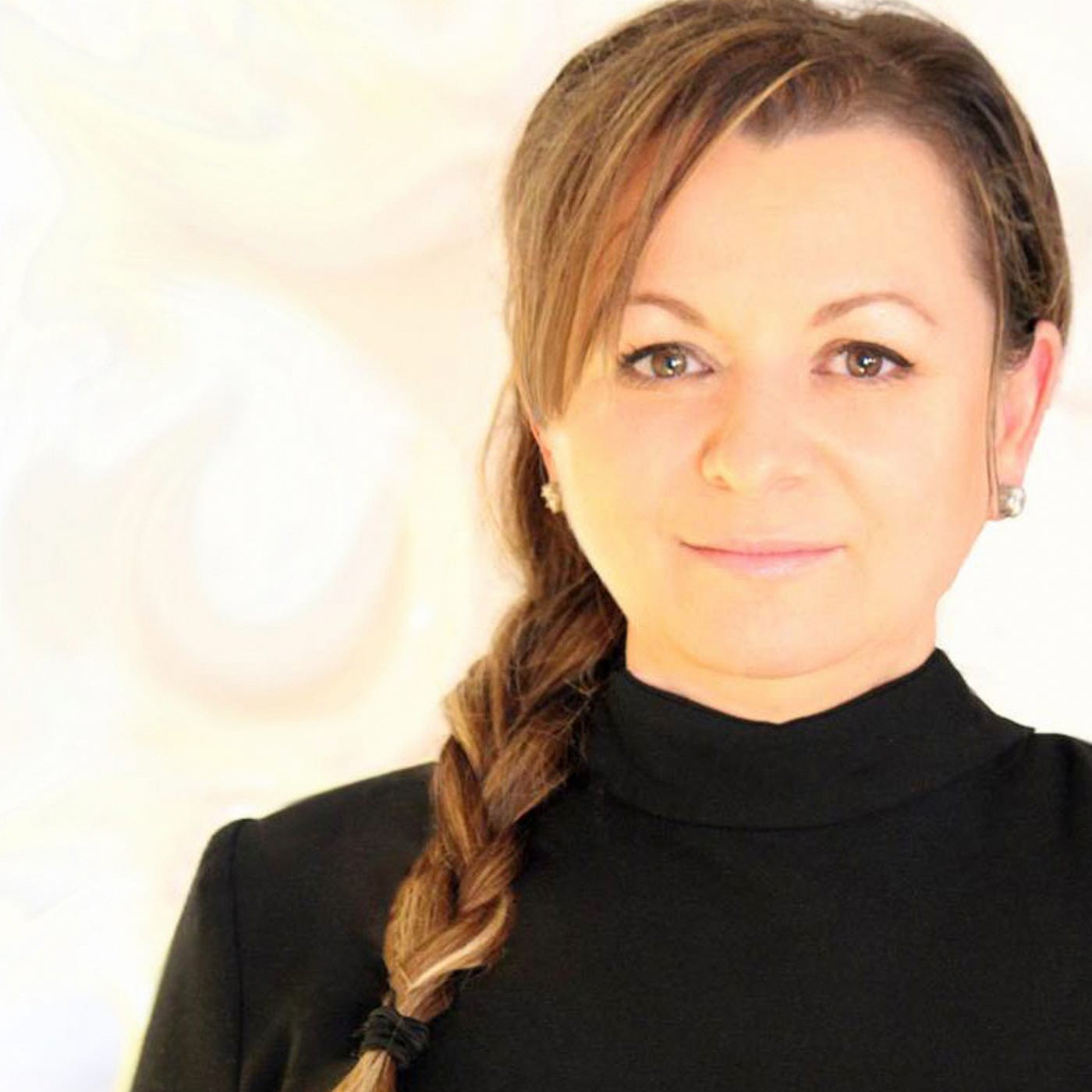 Ildi Pekar poses for a headshot.