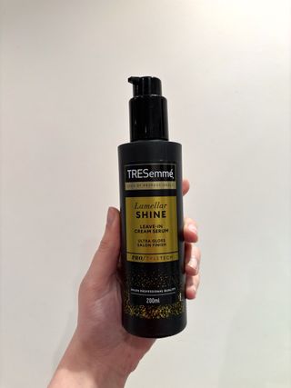 Mica Ricketts holding Tresemme Lamellar Shine Cream Serum