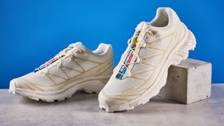 Salomon XT-6 in Vanilla Ice photographed in front of a blue background
