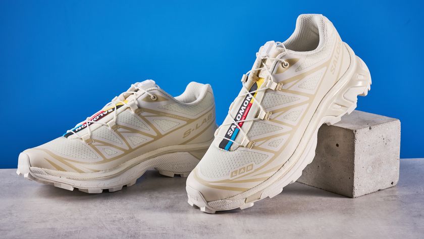Salomon XT-6 in Vanilla Ice photographed in front of a blue background