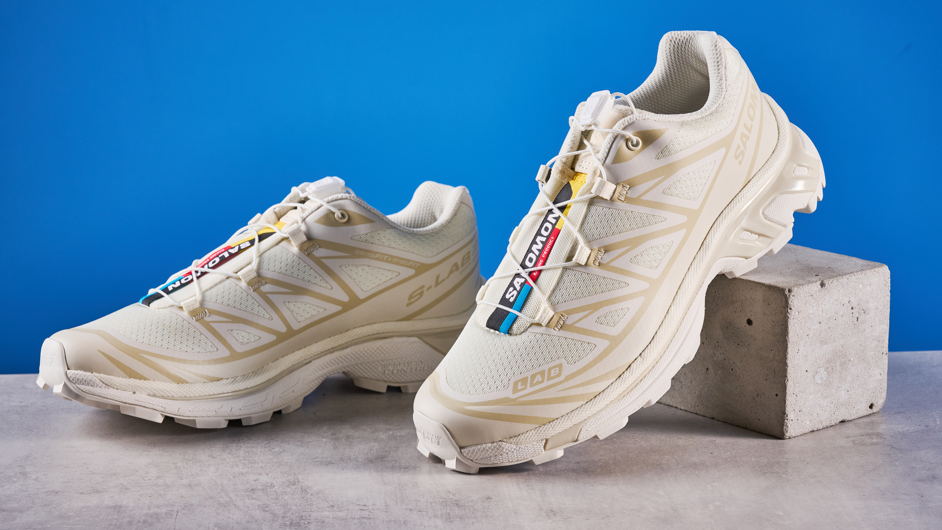 Salomon XT-6 in Vanilla Ice photographed in front of a blue background