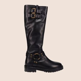 flat lay image of black leather boots