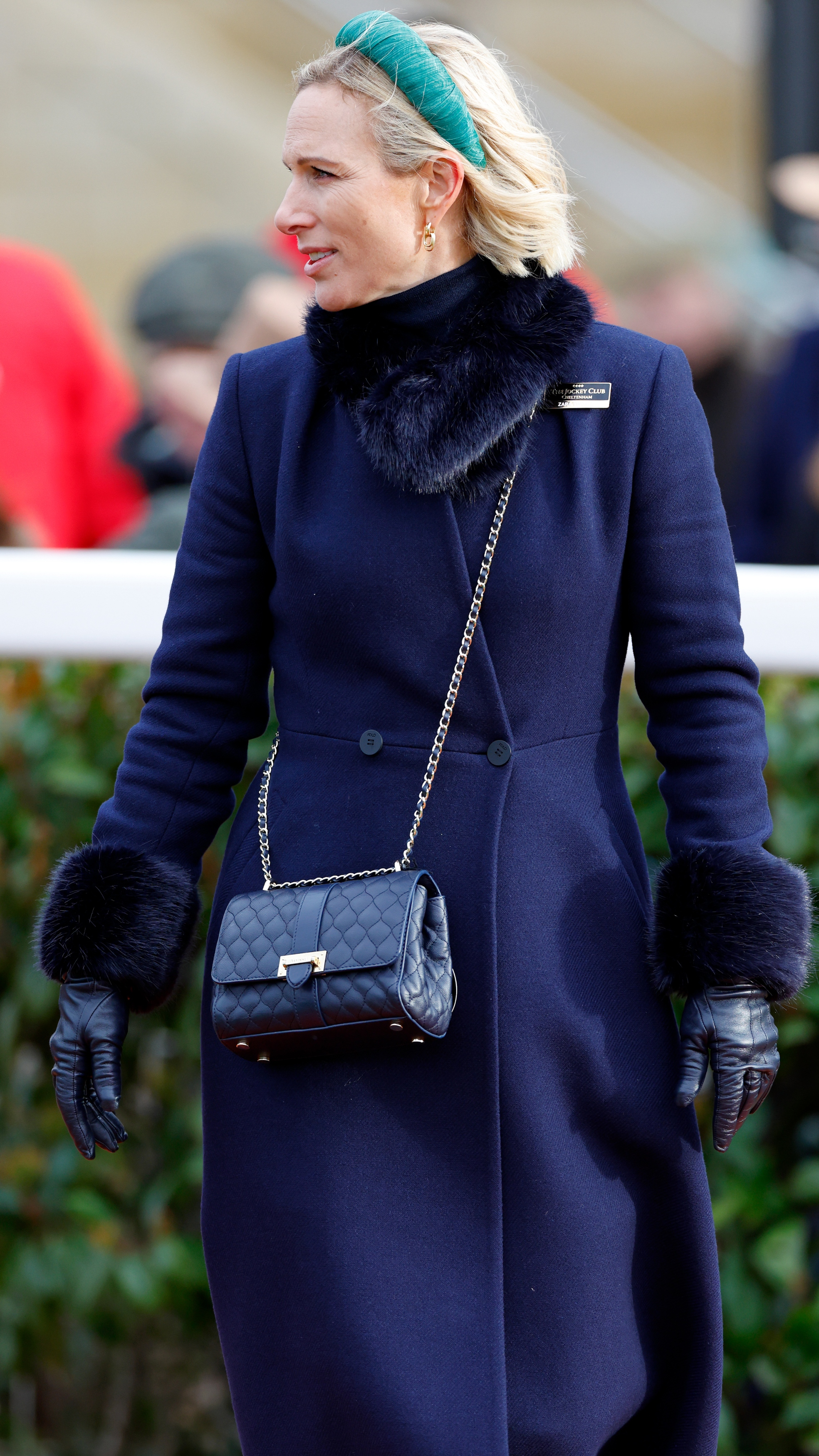 Zara Tindall attends Festival Trials Day at Cheltenham Racecourse on January 24, 2026 wearing an Aspinal Lottie bag