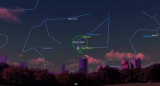 Graphic ilustration from Starry night software showing the moon and saturn close together in the night sky with a green circle surrounding them to demonstrate the observable field of view through a pair of binoculars. 