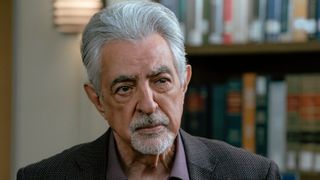 Joe Mantegna as David Rossi looking serious in a close-up from Criminal Minds: Evolution.