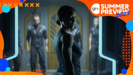 A woman turns to look at an unseen person while standing in front of crew mates behind a glass screen in Directive 8020