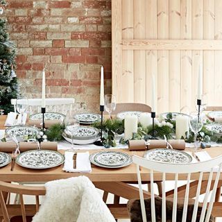 Christmas dining table with green and white plates