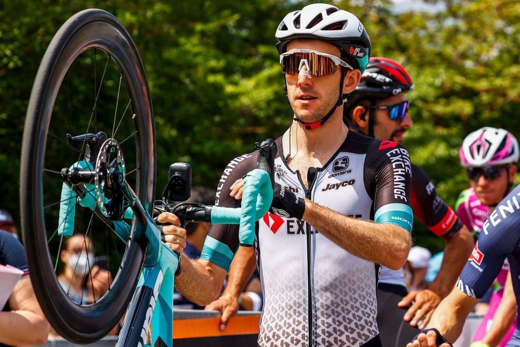Team BikeExchange rider Great Britains Simon Yates holds his bicycle prior to the 20th stage of the Giro dItalia 2021 cycling race 164km between Verbania and Valle Spluga Alpe Motta on May 29 2021 Photo by Luca Bettini AFP Photo by LUCA BETTINIAFP via Getty Images