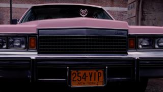 The grill of a pink Cadillac in Goodfellas